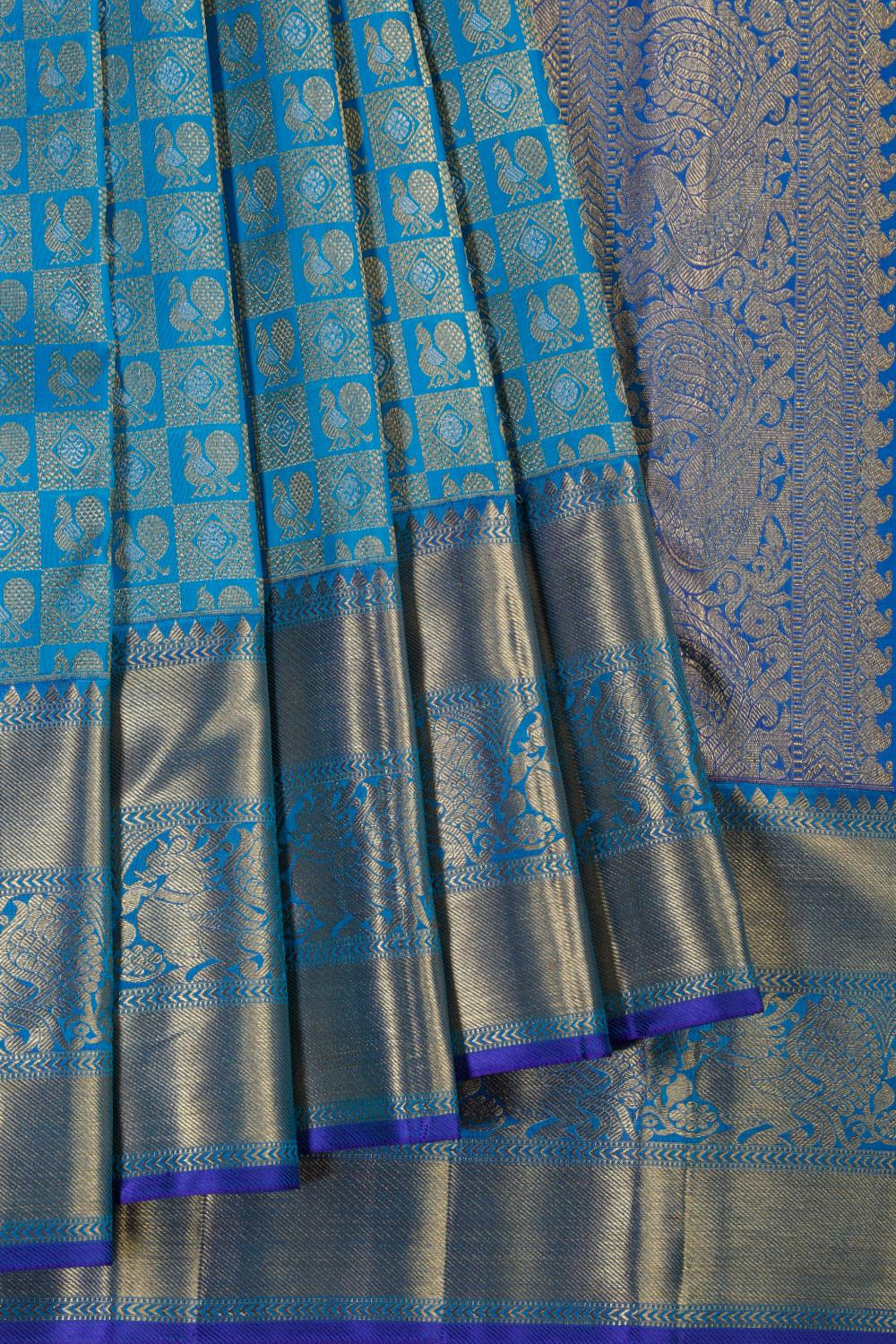Amazing Blue Kanchipattu Saree With Peacocks Border