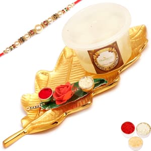 Golden Leaf platter With Rasgullas and Green Leaf Roli Chawal Container  with Pearl Rakhi