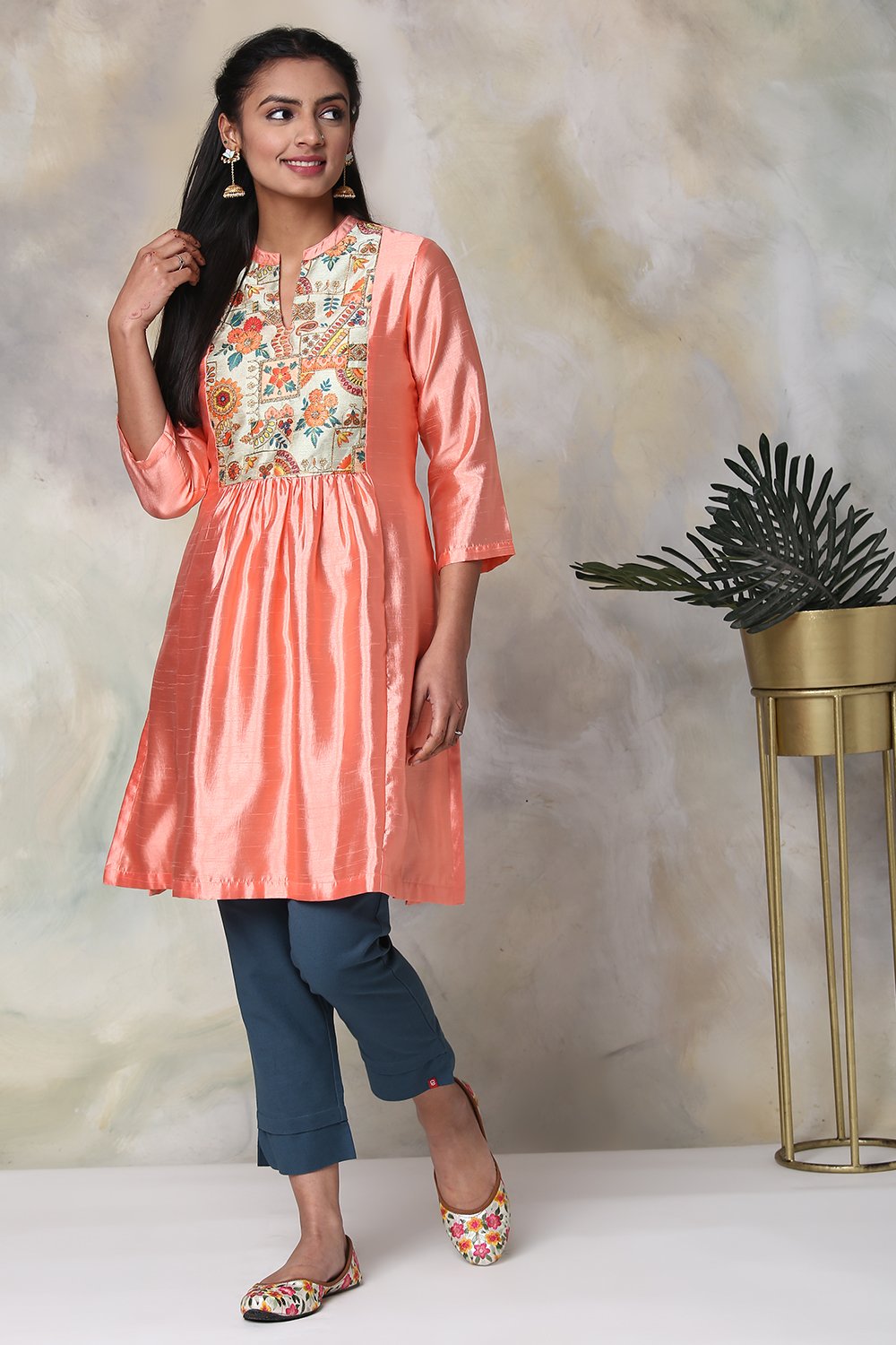 

Peach Art Silk Solid Kurti