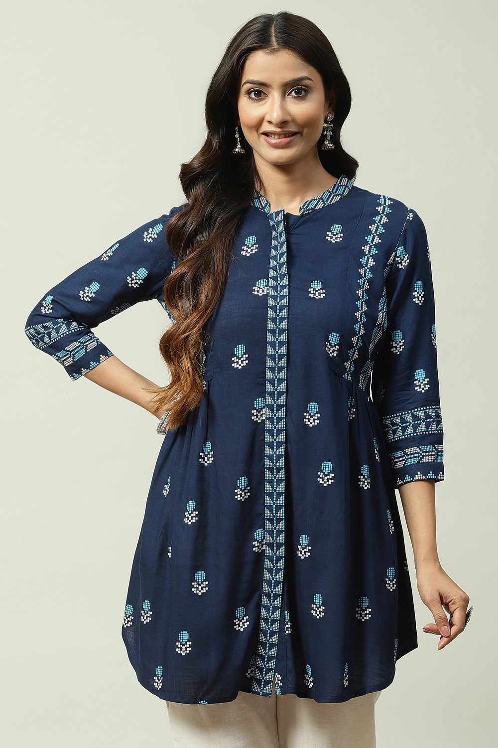 

Navy Rayon Asymmetric Printed Short Kurti