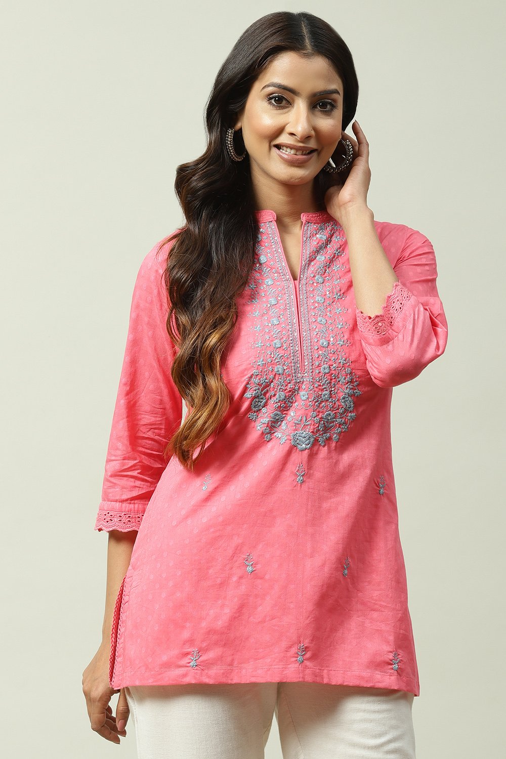 

Pink Cotton Straight Short Solid Kurti