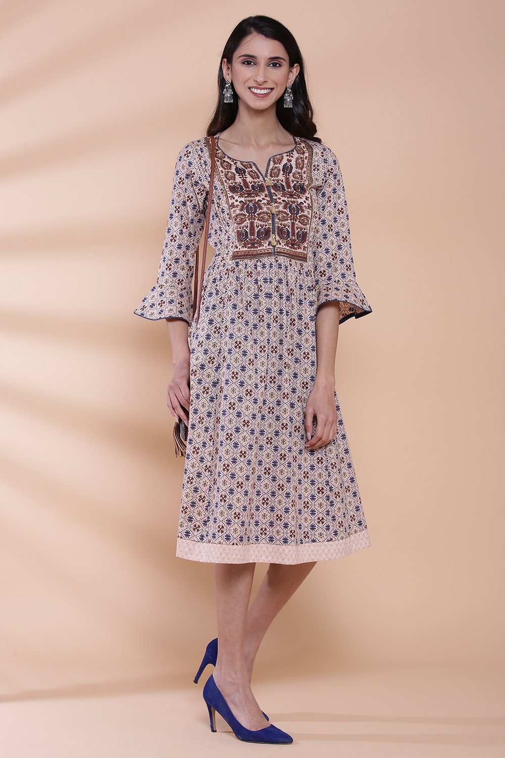 

Peach Cotton A-line Printed Kurta Dress