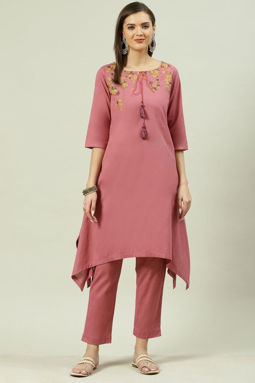 

Dusky Peach Solid Asymmetric Kurta Slim Pant Suit Set