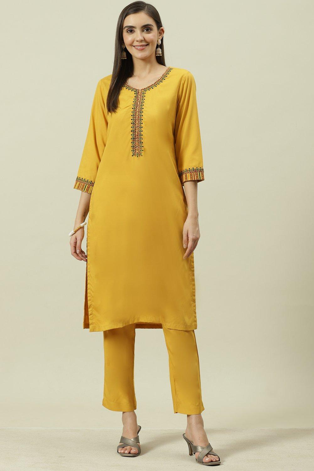 

Yellow Solid LIVA Straight Kurta Regular Pant Suit Set