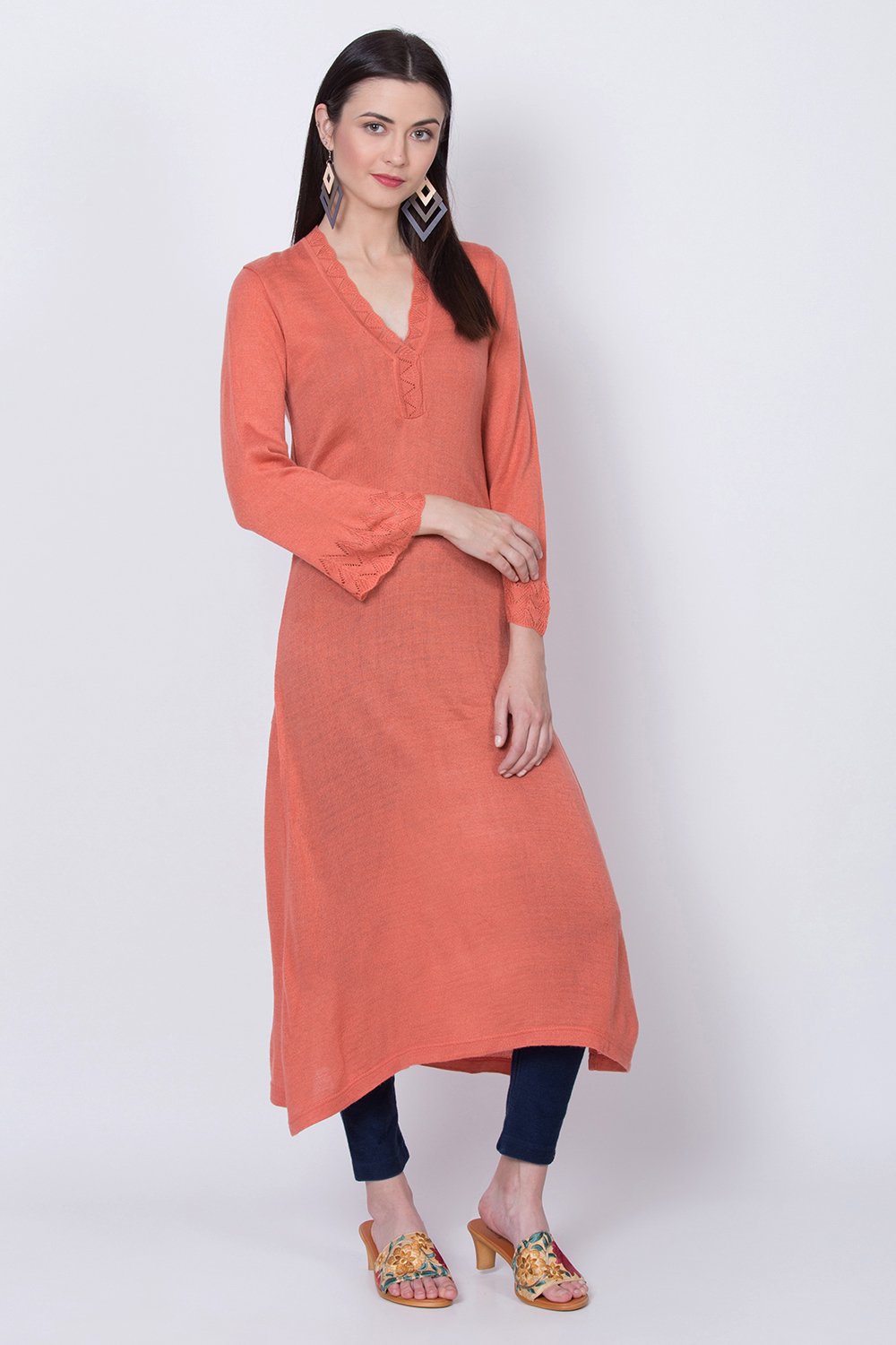 

Peach Straight Woolen Solid Kurta